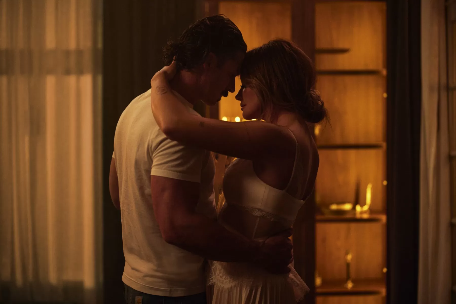 Carly Pearce and Riley Green Caress and Cuddle in Sultry Video for ‘If I Don’t Leave I’m Gonna Stay’: Watch