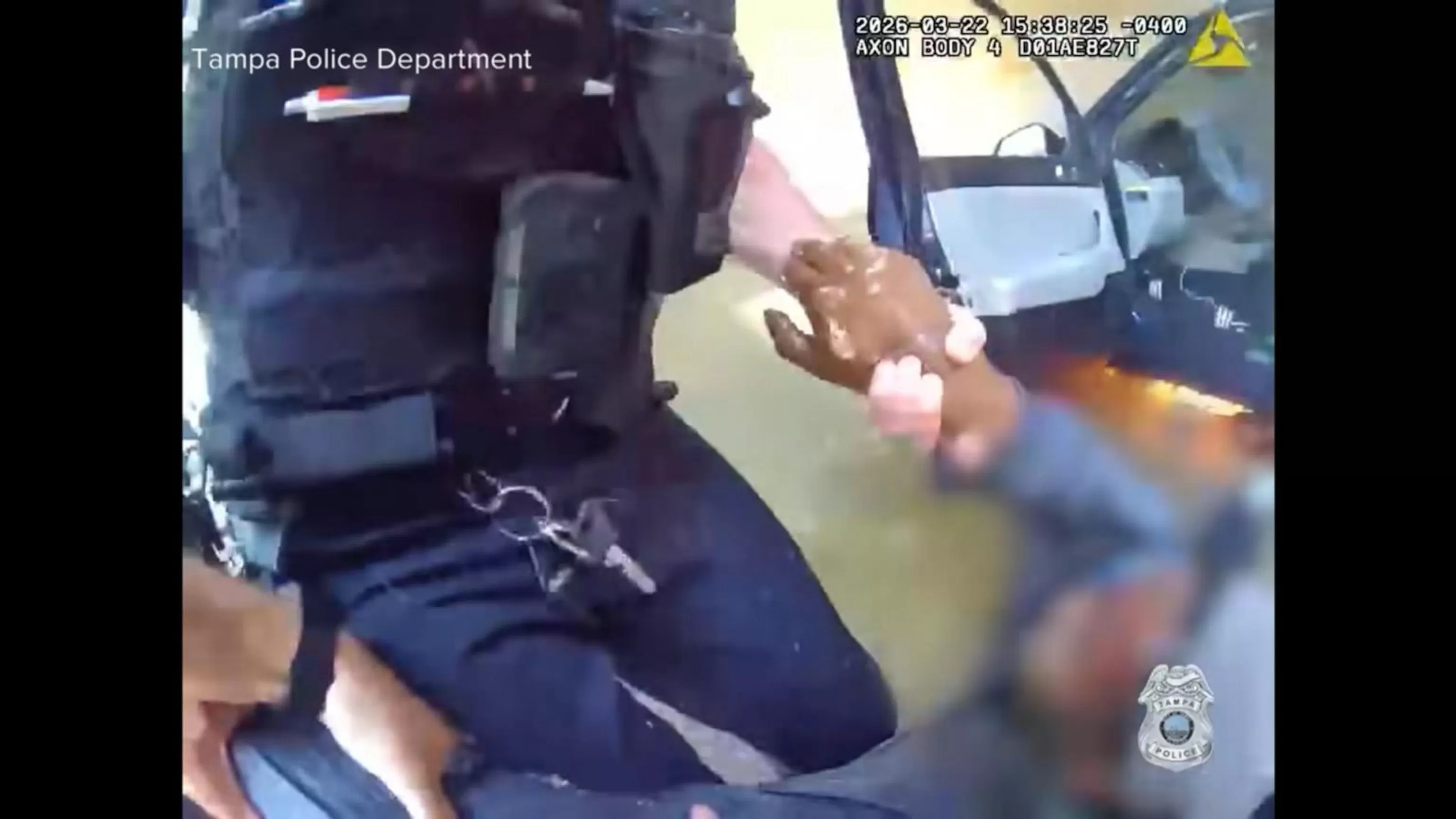 WATCH:  Video shows man being pulled from burning car in Tampa