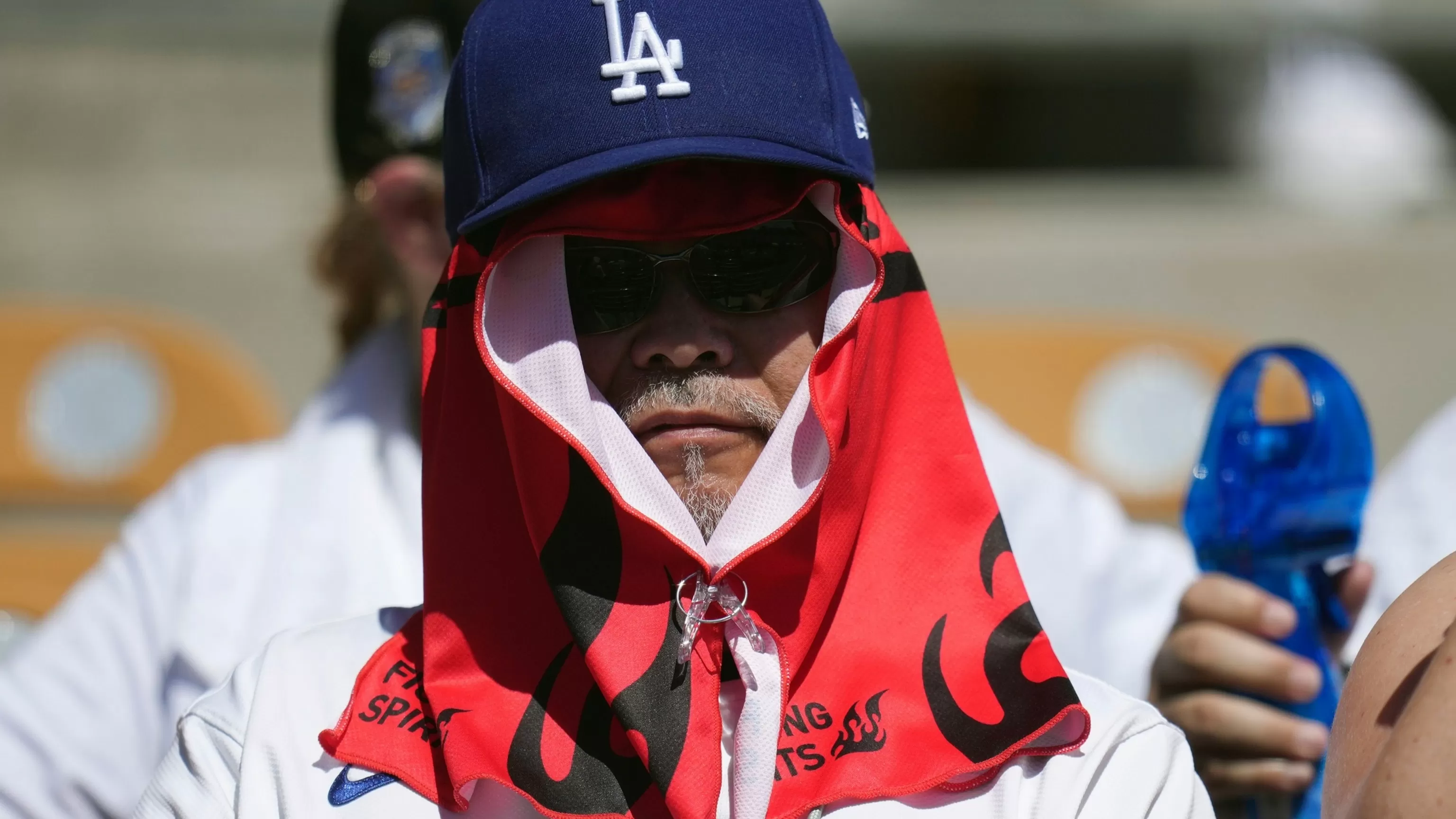 Record temperatures bake the West as heat sickens hundreds at air show