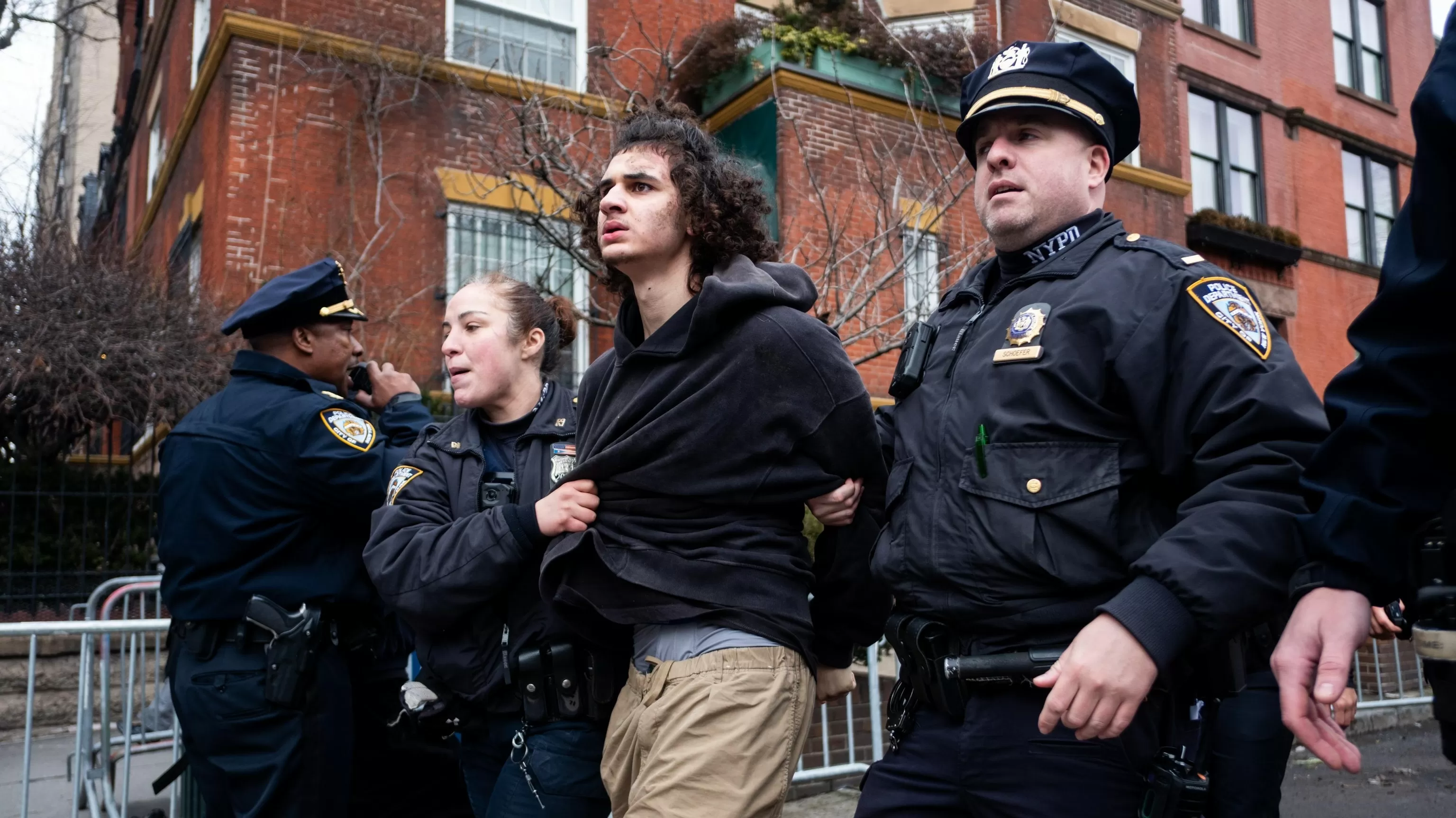 FBI hunts for clues after 2 men charged with lighting bombs at NYC protest