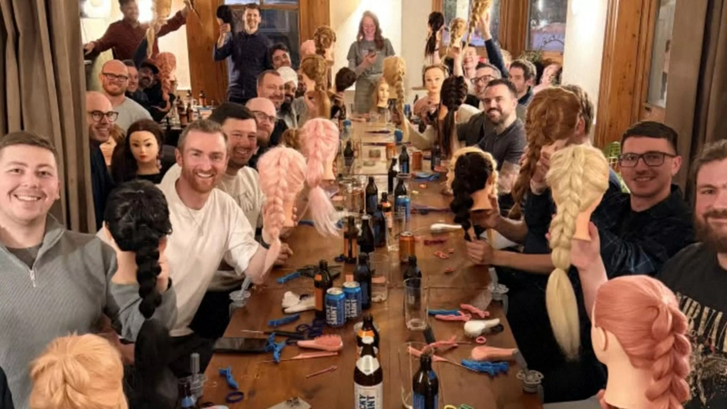 WATCH: Dads gather to learn how to style their daughters' hair