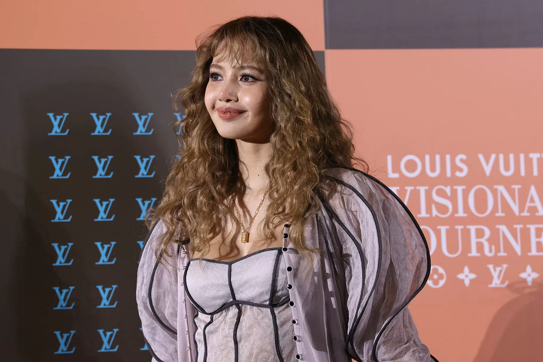 BLACKPINK’s Lisa Shares Adorable Moments With Viral Monkey Punch in Japan