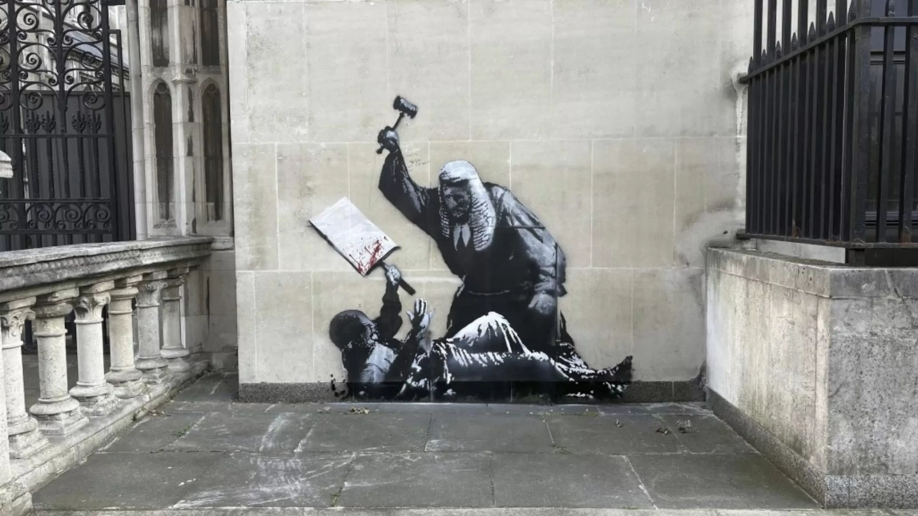 WATCH: Banksy unmasked?