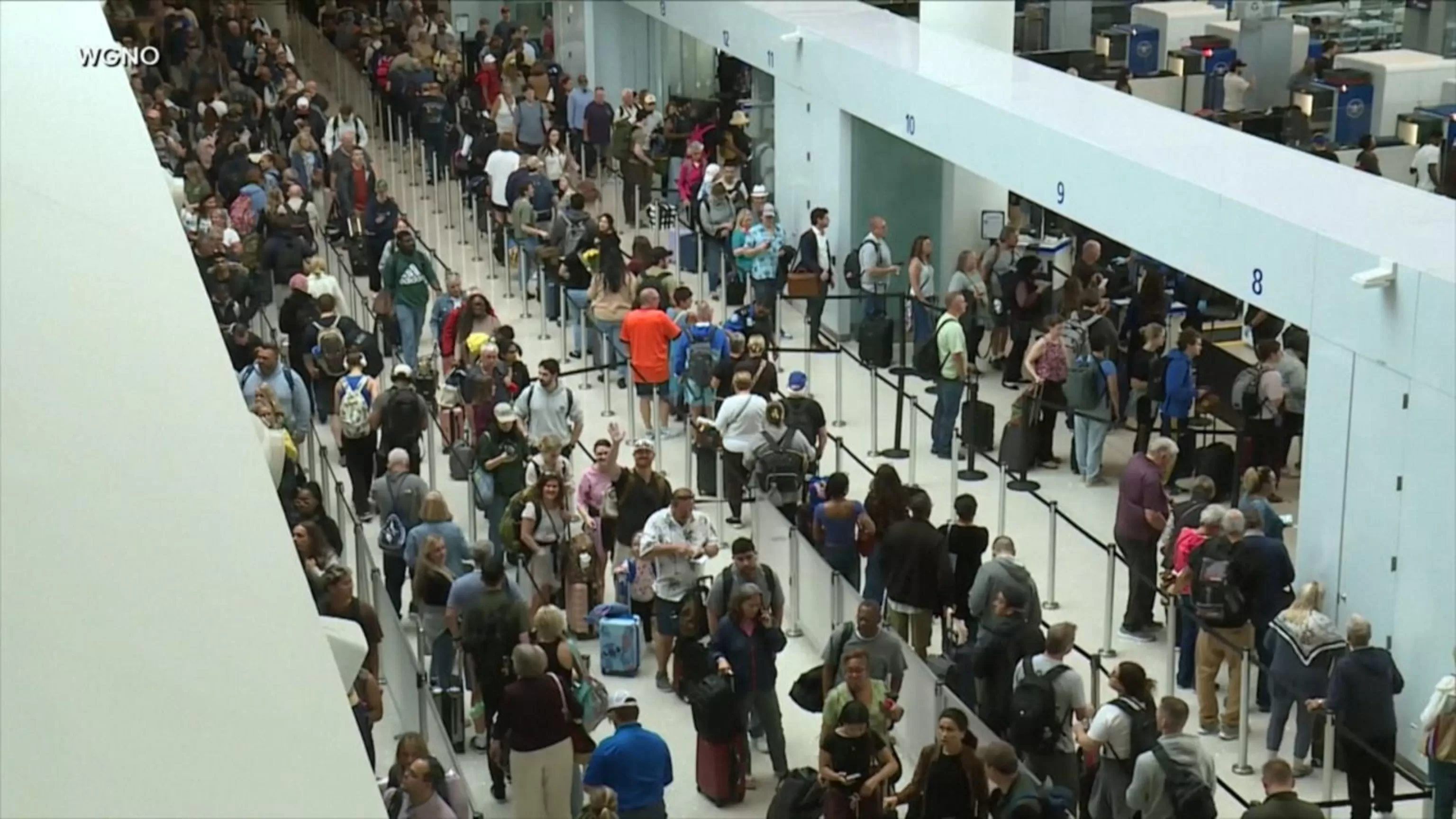 WATCH: Travelers stuck in long lines amid TSA staffing shortages, partial gov shutdown