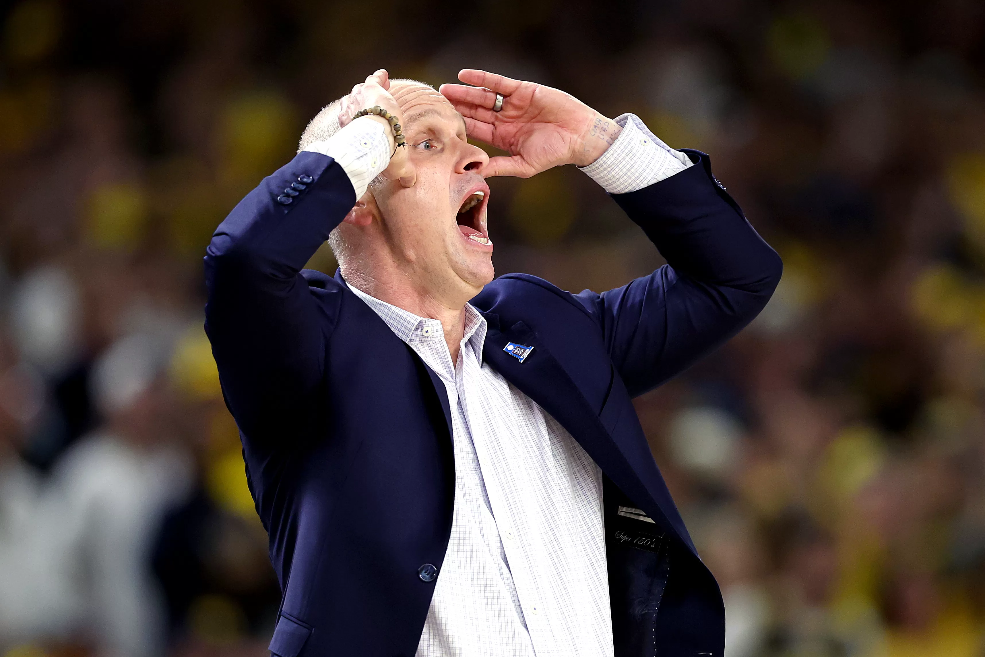 NCAA Title Game Called ‘Rigged’ as Fans Slam Refs in Michigan Win vs UConn